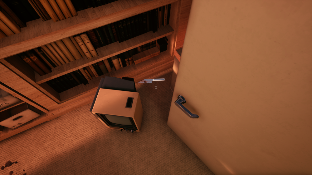 Image of a bloody knife behind an overturned TV.