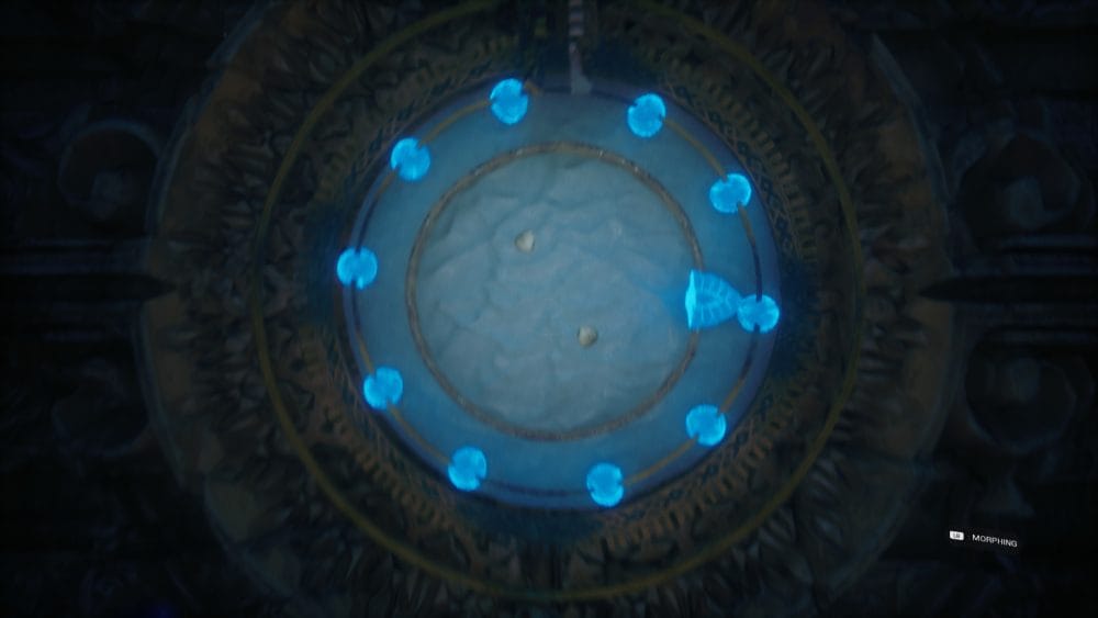 Door puzzle showing a ring of lights with a glowing arrow and tow rocks in the middle