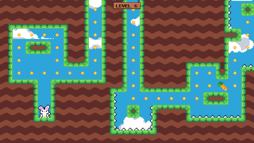 Early level of Runny Bunny showing spike traps along with power pellets and carrots that need to be collected.