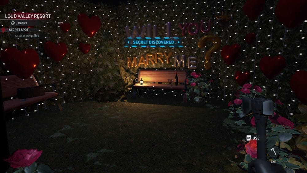An area is lit with fairy light and heart flowers. A bench has Will You Marry Me? written in balloons above it.