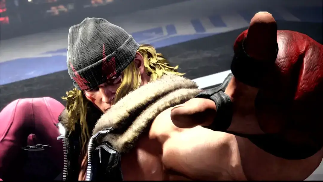 Alex looks up at the camera and points up seemingly into the crowd or at the player through the camera.