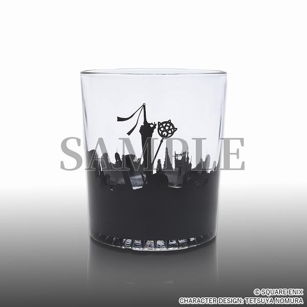 a short, clear glass with black silhouette design printed around the base, covering approximately halfway up the glass. The silhouette depicts the ruins of Zanarkand, with Tidus' sword and Yuna's staff as a focal point.
