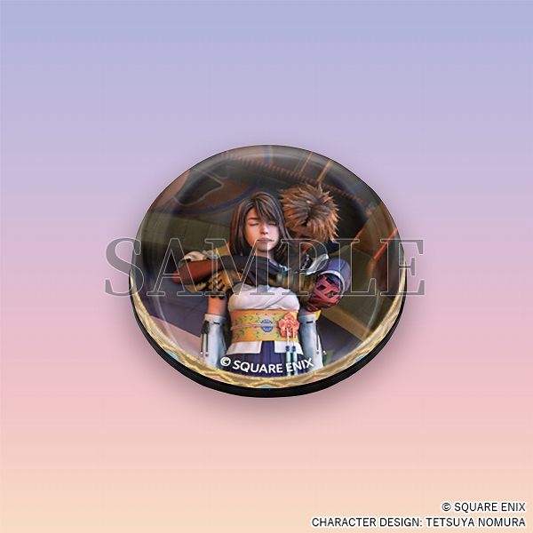 A clear glass sphere magnet with a still of Tidus hugging Yuna from behind.