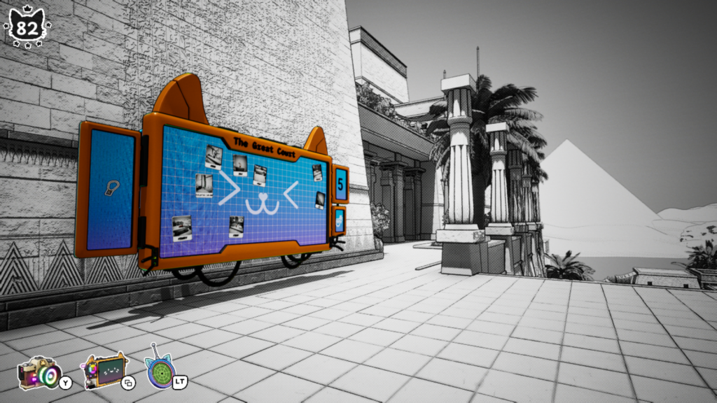A large, orange digital noticeboard with blue screens floats next to a brick wall, a cat's face and several photos on the main screen. In the background are columns, palm trees, and a pyramid.